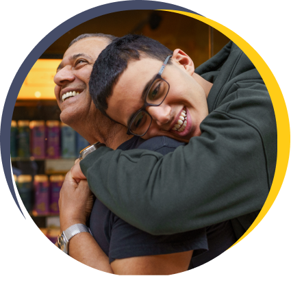 youth hugging caregiver